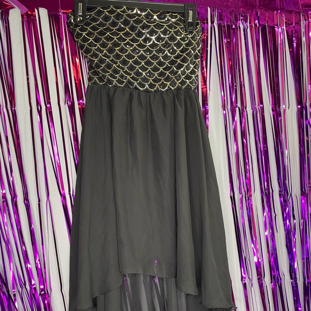 High-low flowy dress with black and gold sequins.
